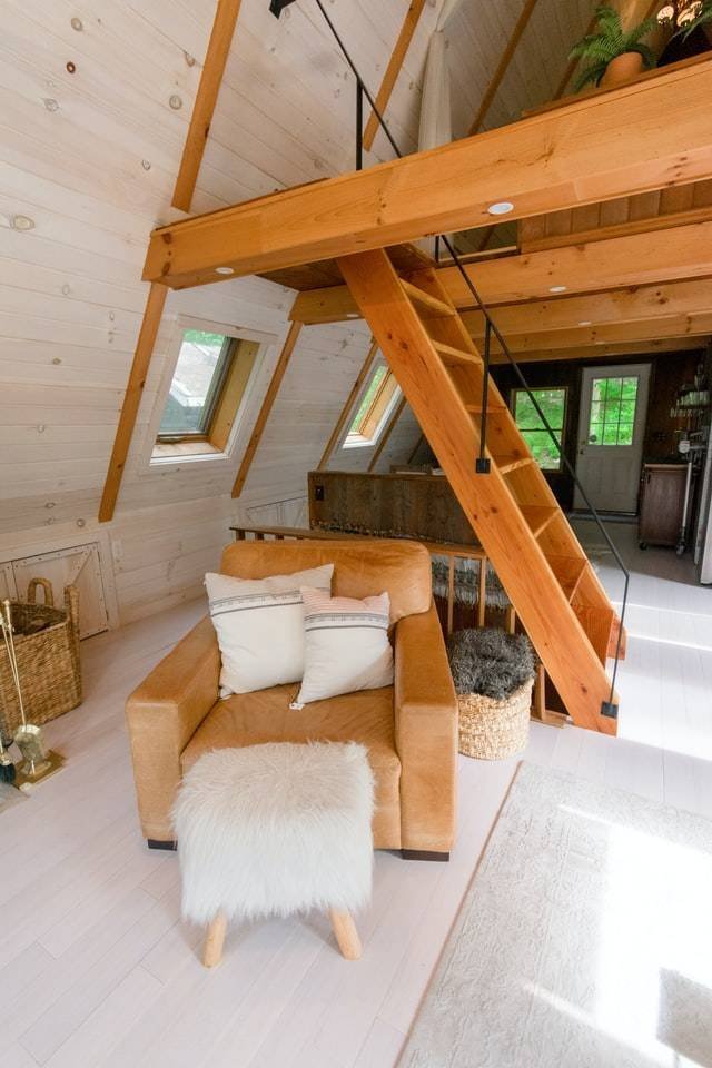 Armchair with leg rest in living room.